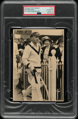 The Argus - 'Don Bradman going out to bat - 5th Ashes Test (MCG)' (1937) - PSA Type I Authenticated Photo