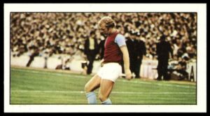 Barratt & Co - 'Football Stars (1973)' #13 - Bobby Moore (West Ham United) Barratt & Co - 'Football Stars (1973)' #13 - Bobby Moore (West Ham United)